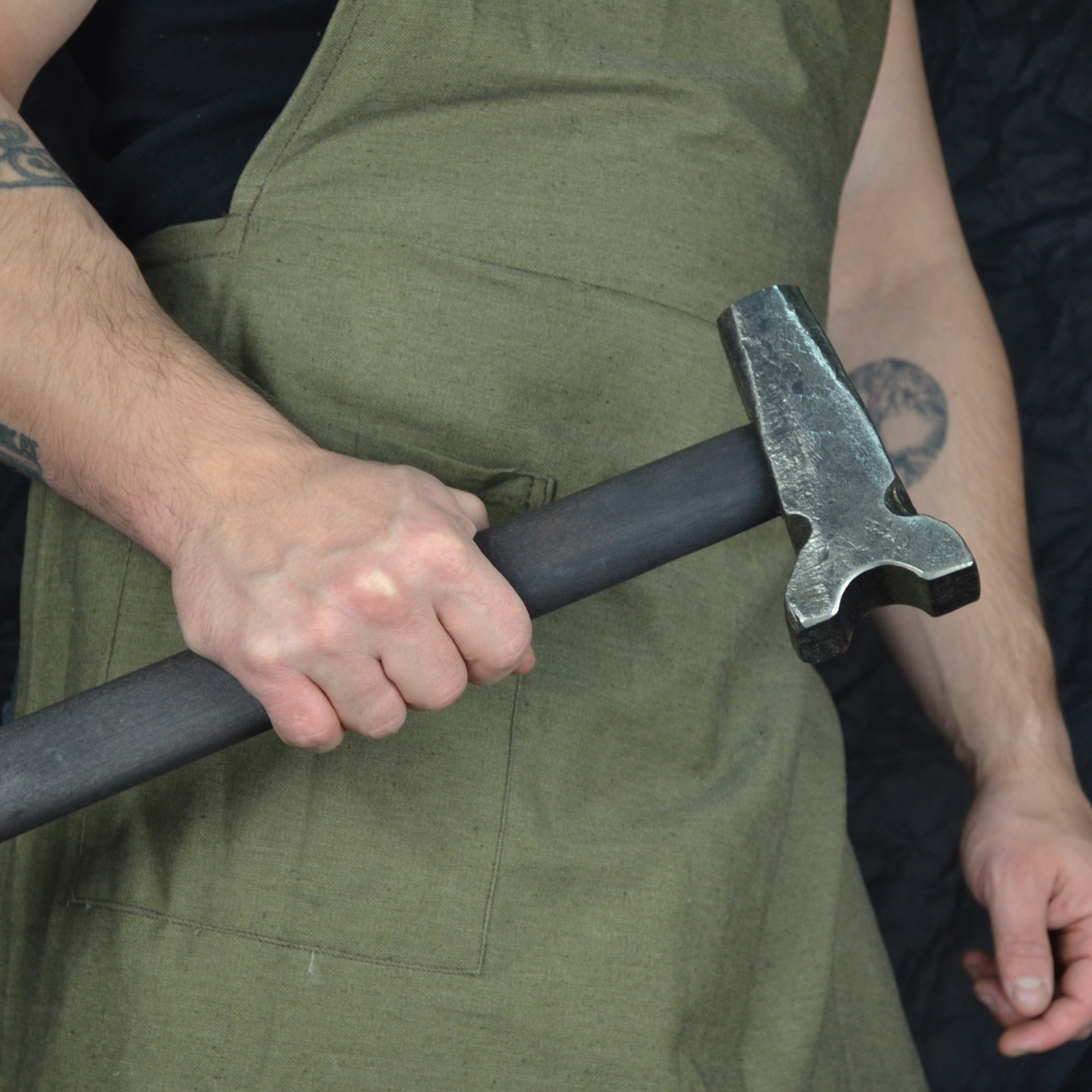 Blacksmith top swage hammer with different work zones